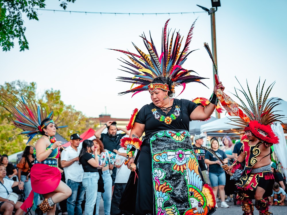 Aztec dancer performing at a Bonfire cultural festival on Havana Street